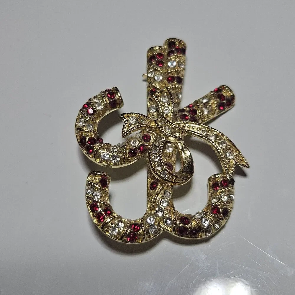 **Final Sale** Monet Christmas Candy Cane Bow Red Clear Gold Tone Brooch